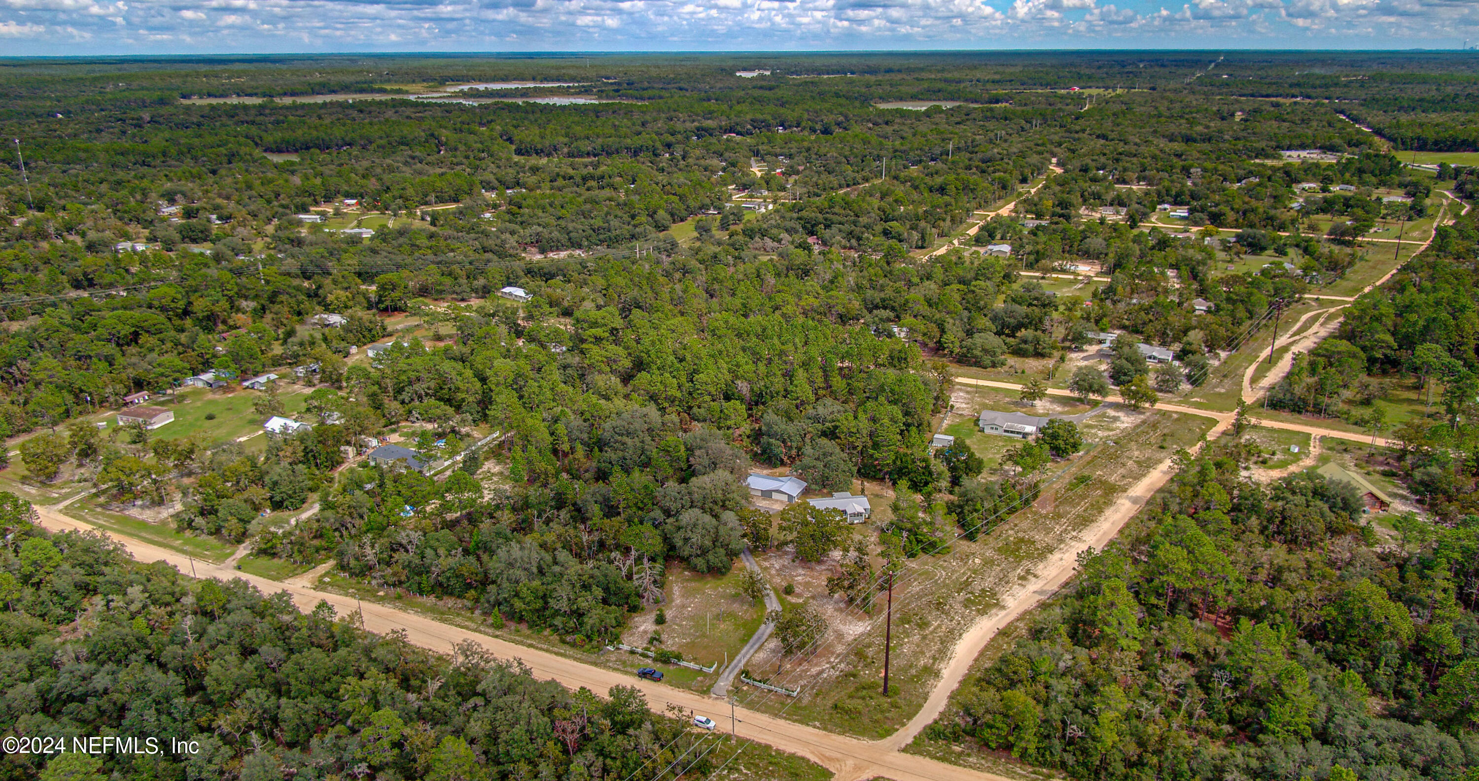 7677 Oak Forest Road Keystone Heights, FL 32656 - Photo 50 of 54 a view of a field with an outdoor space
