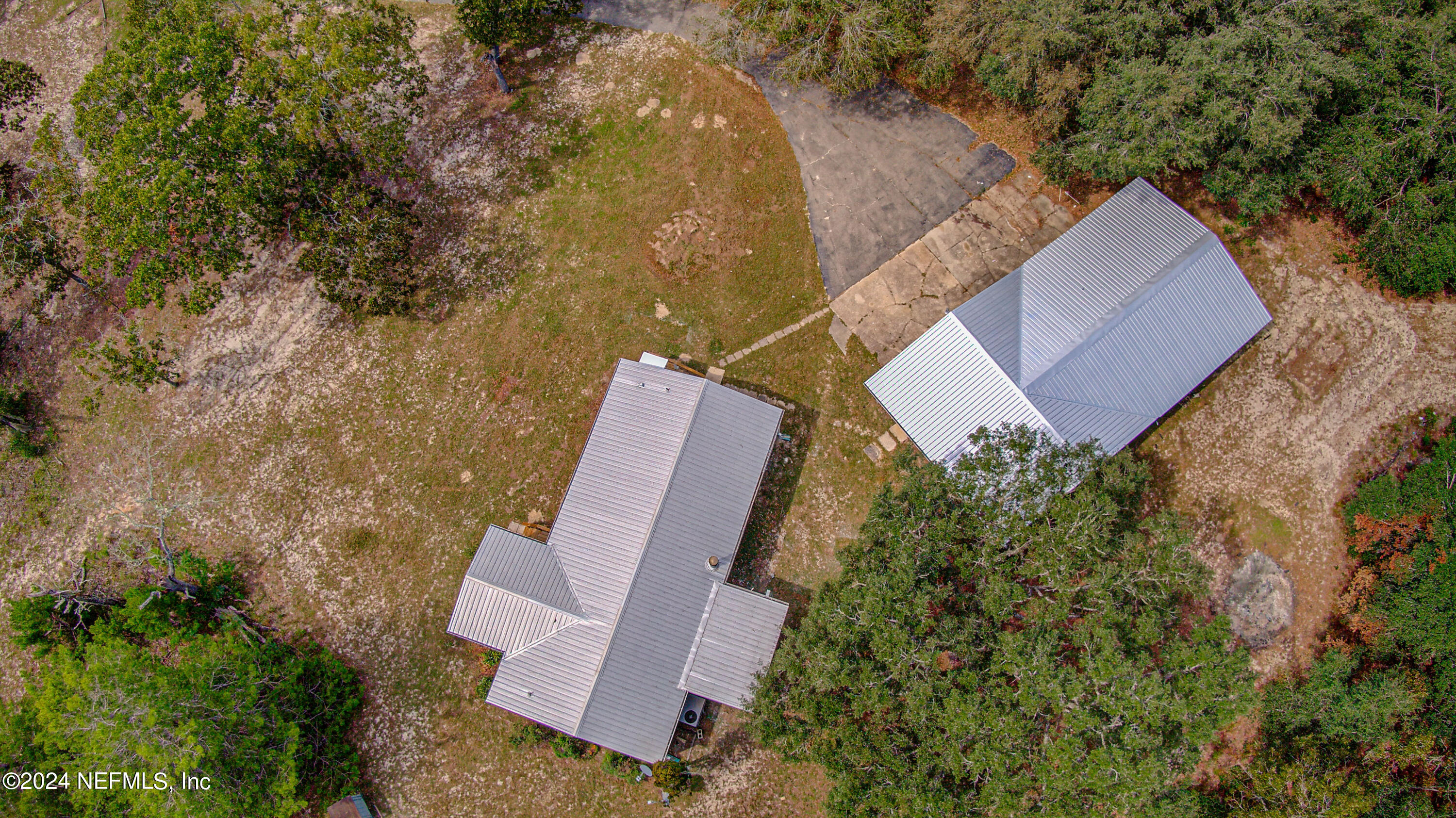 7677 Oak Forest Road Keystone Heights, FL 32656 - Photo 53 of 54 an aerial view of a house with outdoor space
