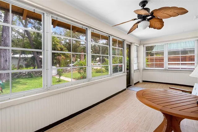 a view of a livingroom with furniture and window
