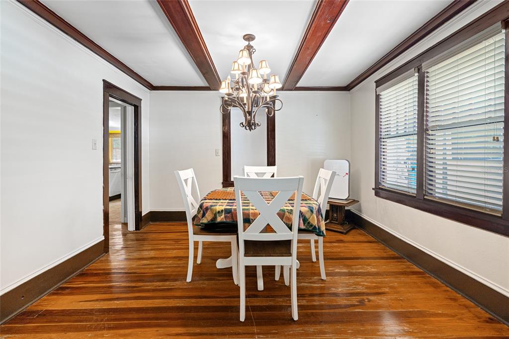 11 62nd Street Yankeetown, FL 34498 - Photo 16 of 33 a view of a dining room with furniture and wooden floor