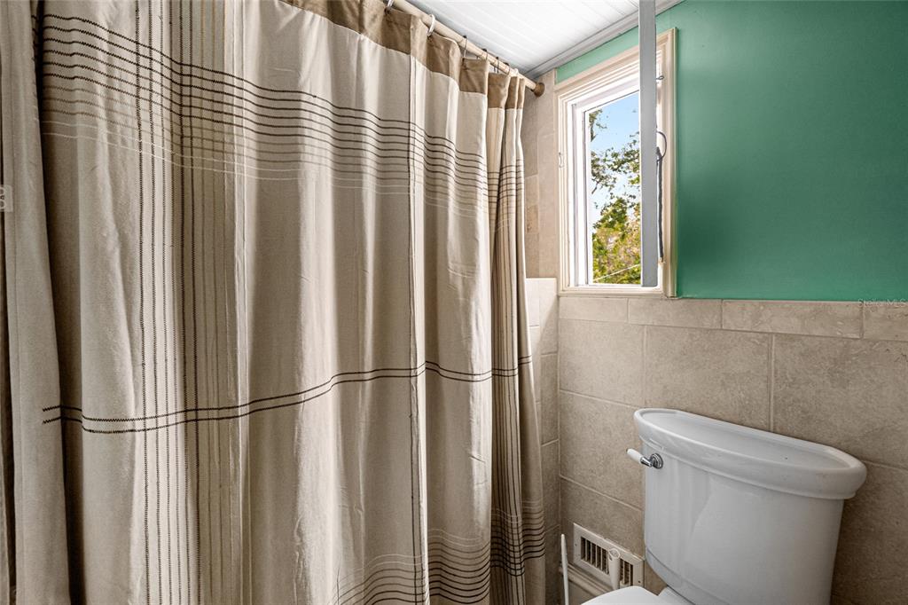 11 62nd Street Yankeetown, FL 34498 - Photo 20 of 33 a bathroom with a toilet and a shower