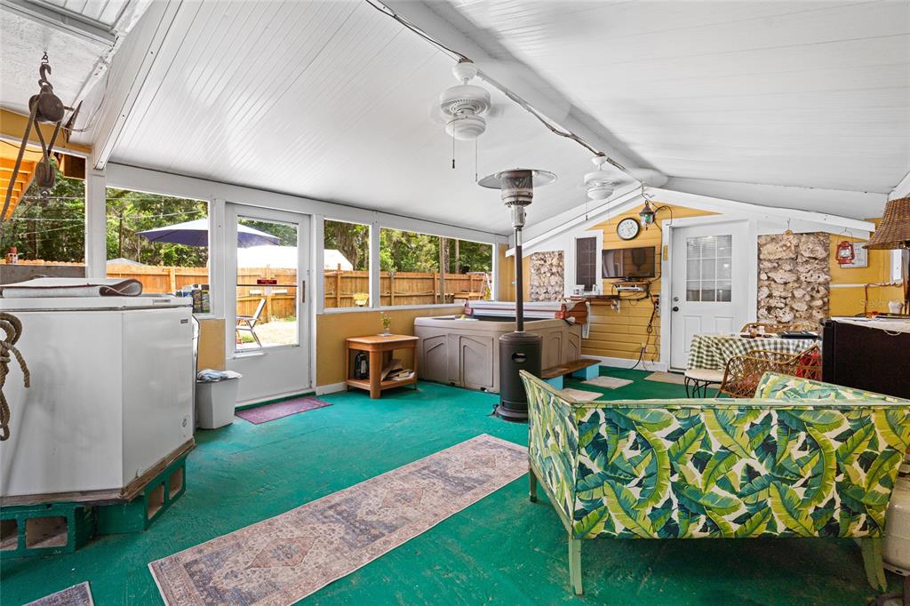 11 62nd Street Yankeetown, FL 34498 - Photo 27 of 33 a living room with furniture a window and a table