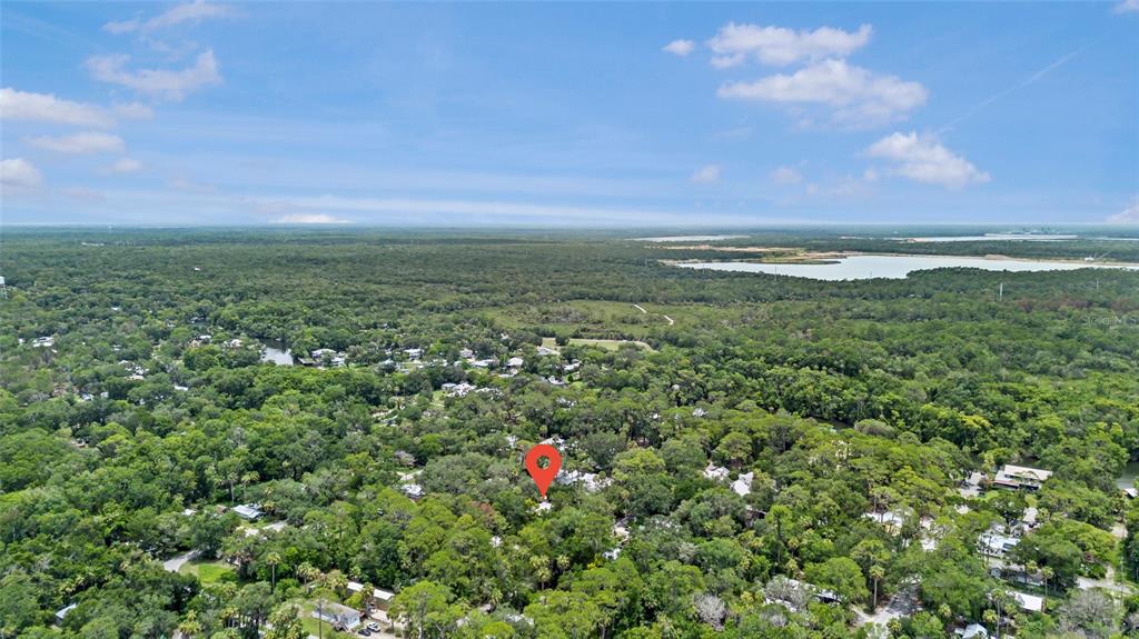 11 62nd Street Yankeetown, FL 34498 - Photo 4 of 33 a view of a field with an ocean