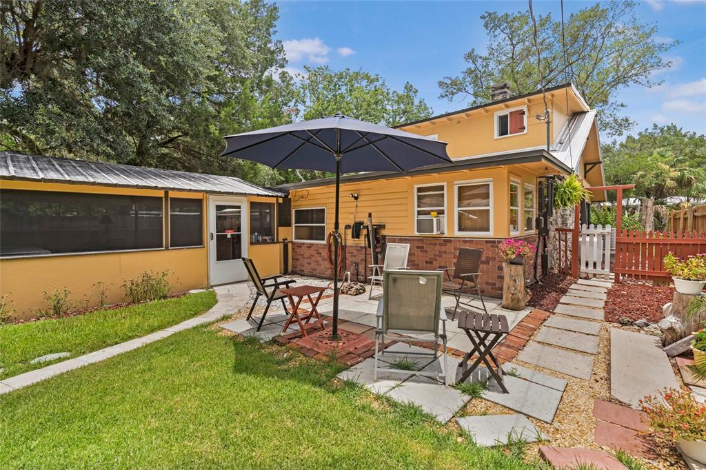 11 62nd Street Yankeetown, FL 34498 - Photo 6 of 33 a view of a house with backyard porch and sitting area