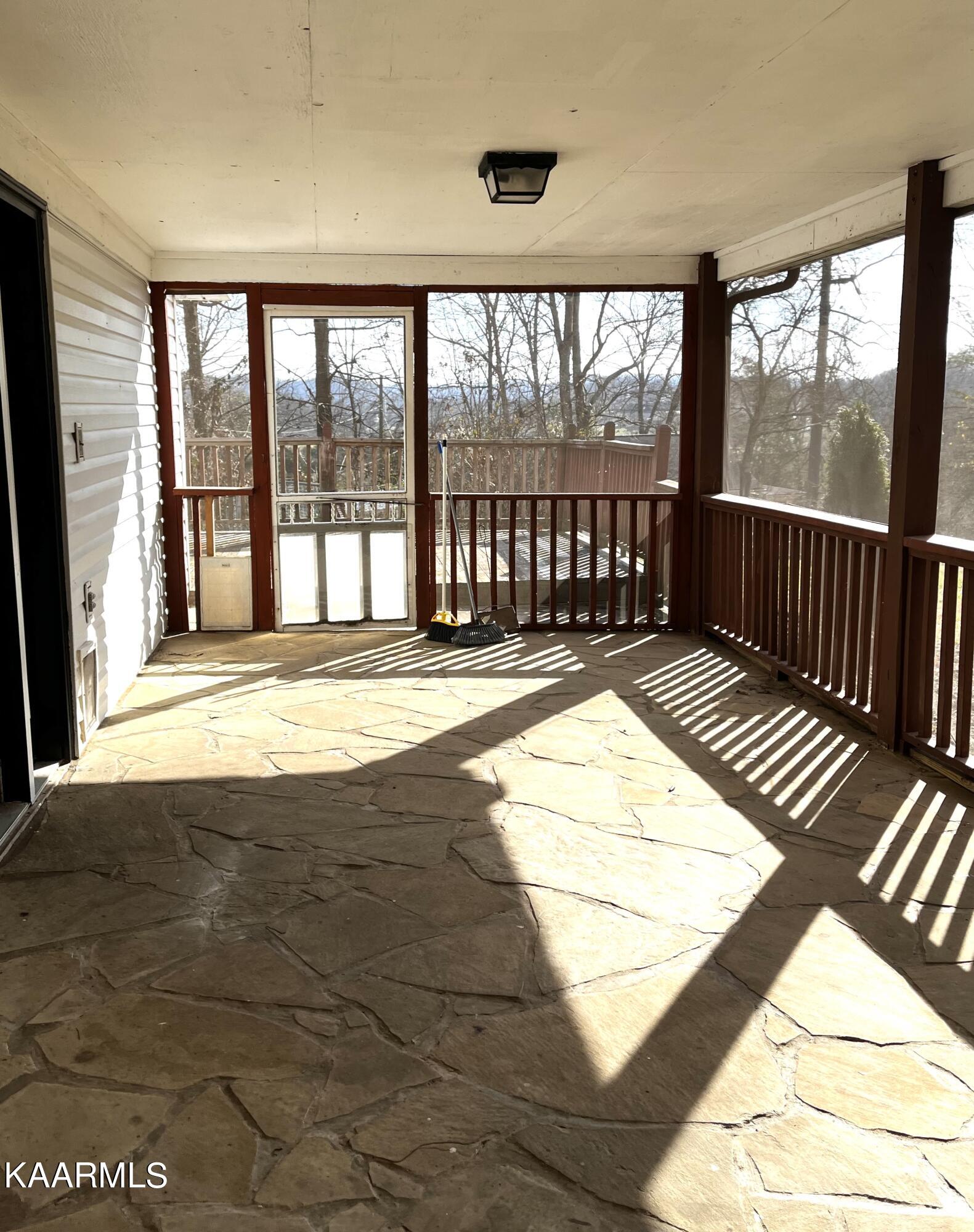 438 Miller Road Clinton, TN 37716 - Photo 14 of 44 Screened porch
