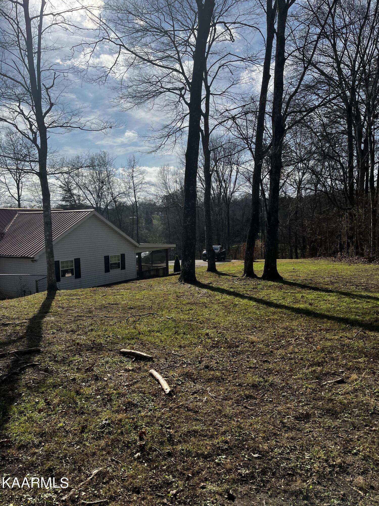 438 Miller Road Clinton, TN 37716 - Photo 19 of 44 left view