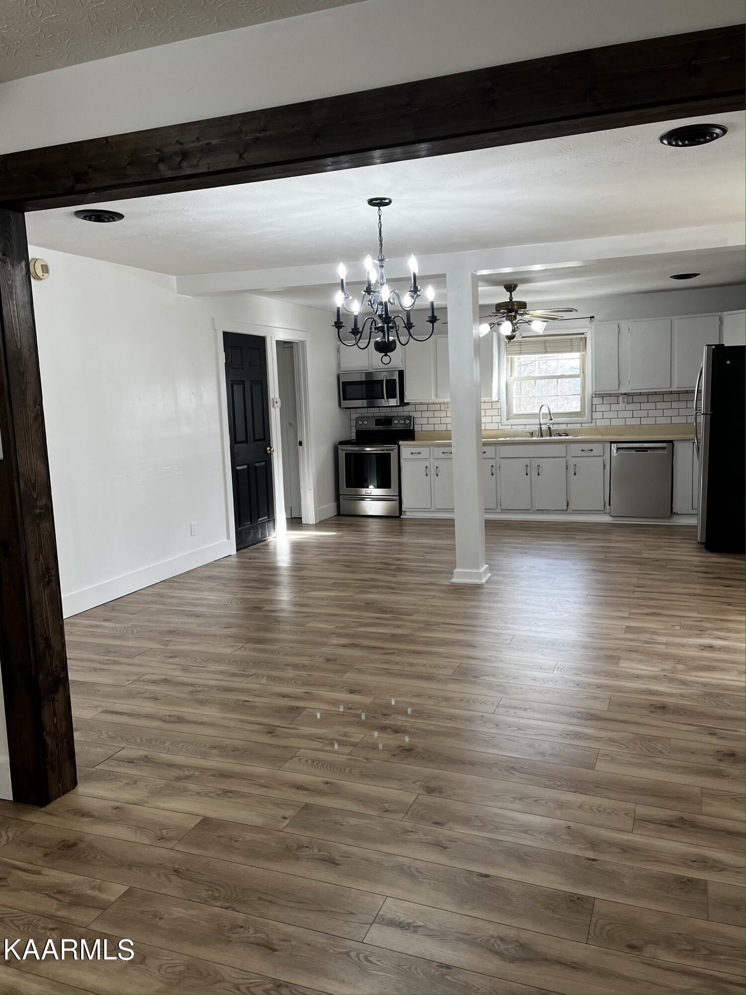 438 Miller Road Clinton, TN 37716 - Photo 27 of 44 living room into dining area