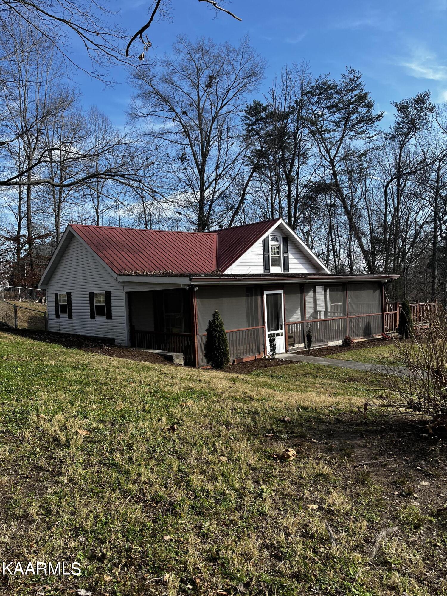 438 Miller Road Clinton, TN 37716 - Photo 3 of 44 left side view