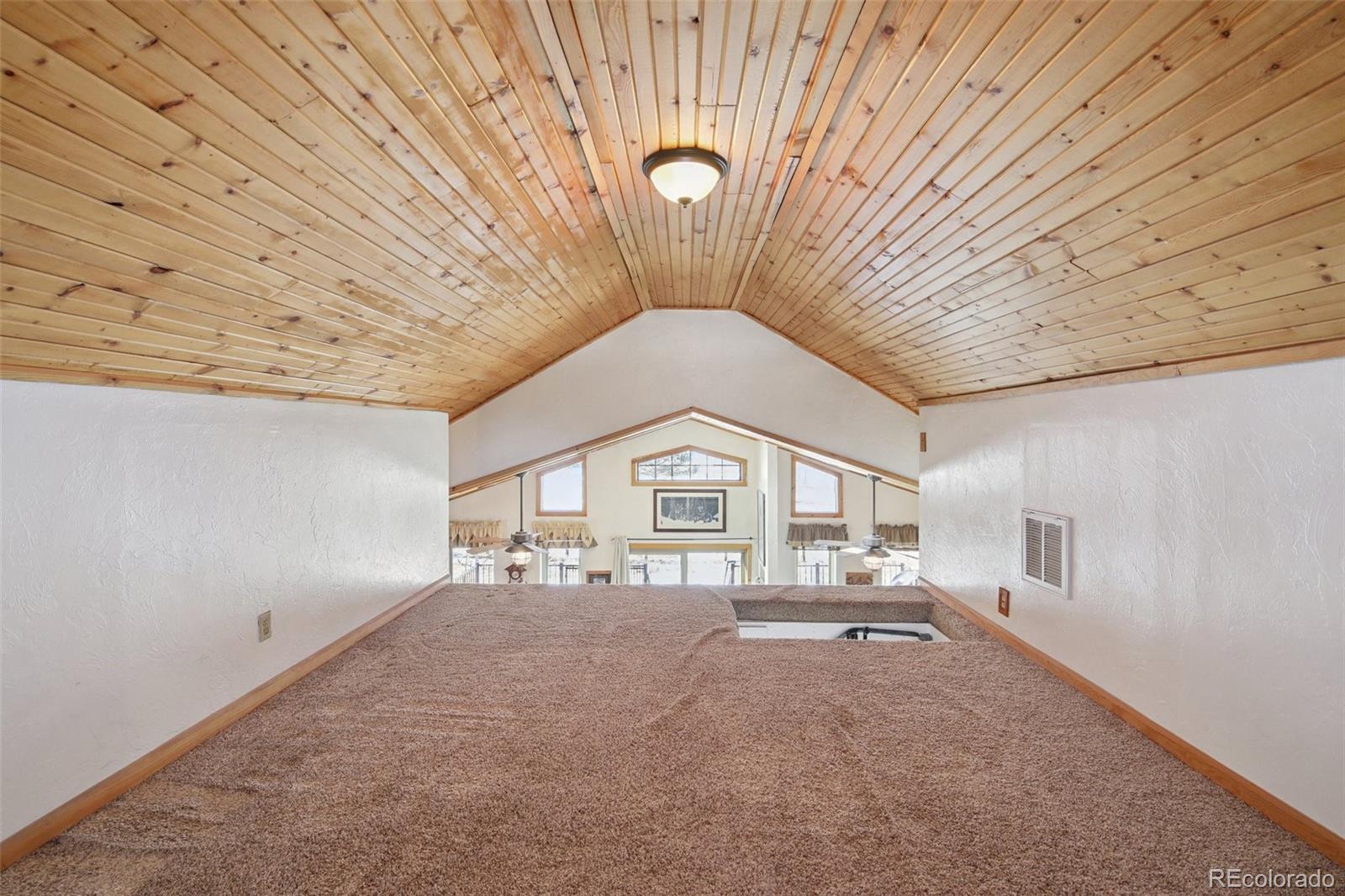 499 Clark Road Bailey, CO 80421 - Photo 15 of 27 a very nice looking room with a large window