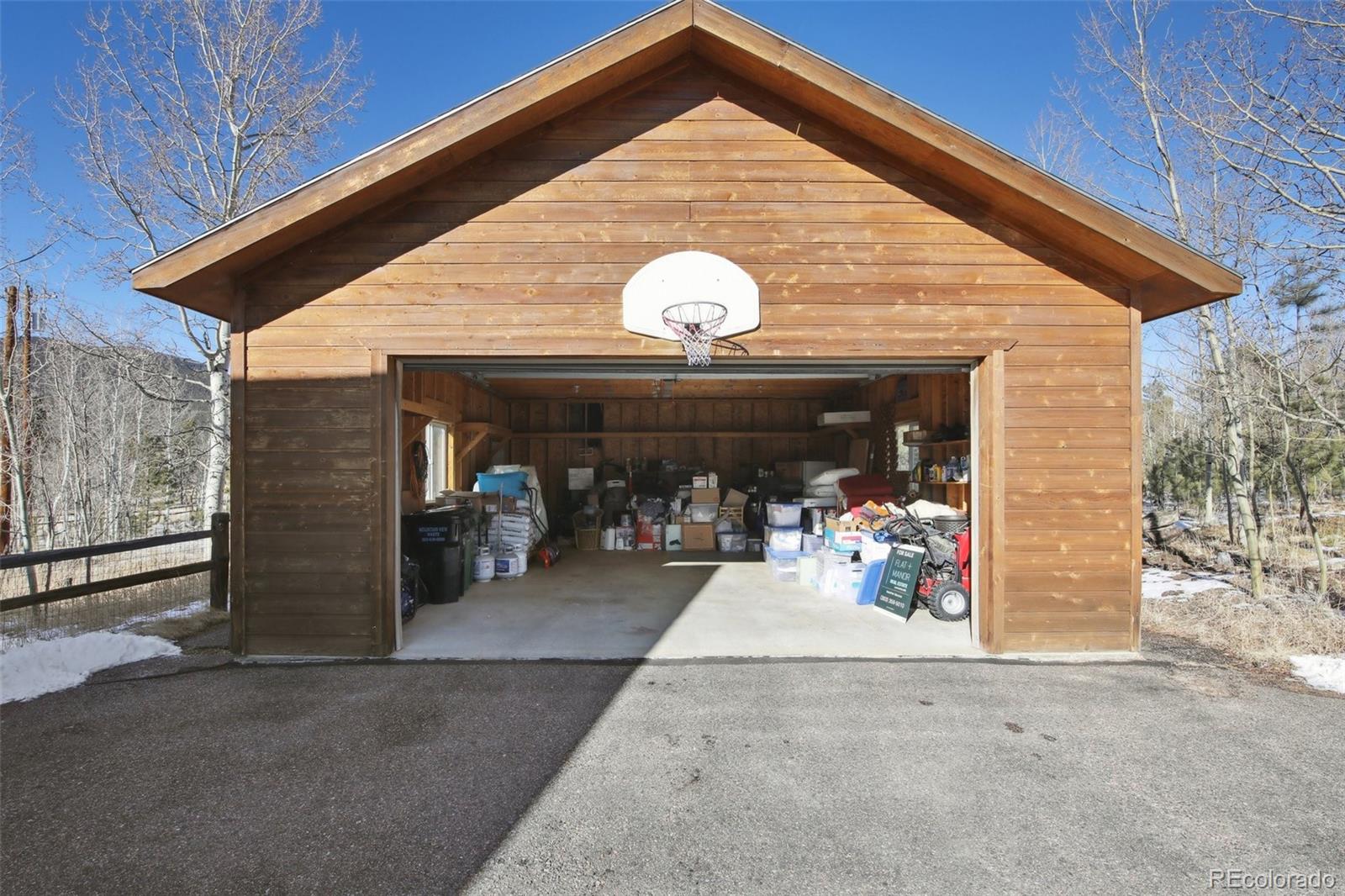 499 Clark Road Bailey, CO 80421 - Photo 22 of 27 a view of a garage