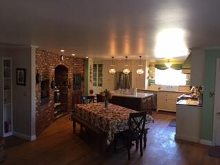 3050 Figueroa Mountain Road Los Olivos, CA 93441 - Photo 5 of 12 a view of a dining room with furniture and wooden floor