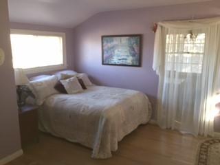 3050 Figueroa Mountain Road Los Olivos, CA 93441 - Photo 7 of 12 a bedroom with a bed and window