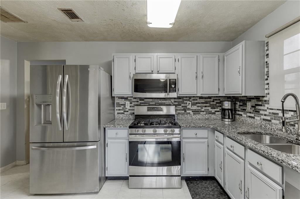 5160 Arrowind Road Northwest Lilburn, GA 30047 - Photo 6 of 25