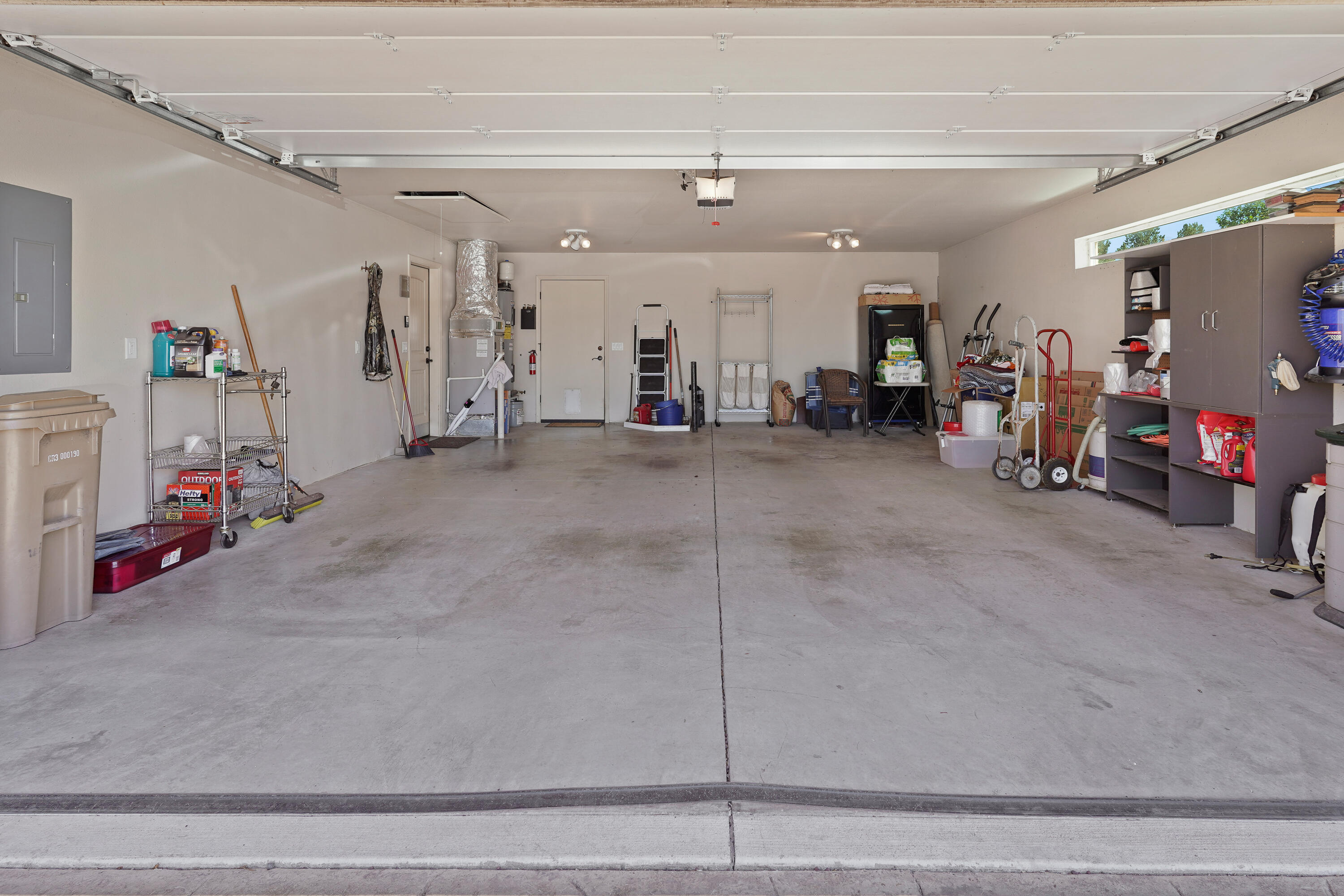 9403 Southwest Panorama Road Terrebonne, OR 97760 - Photo 37 of 51 Spacious double car garage with built in safe in the floor.