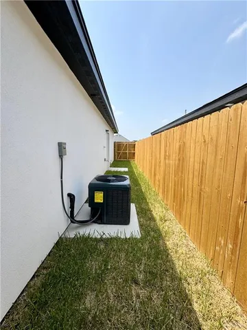 a view of a back yard from a balcony