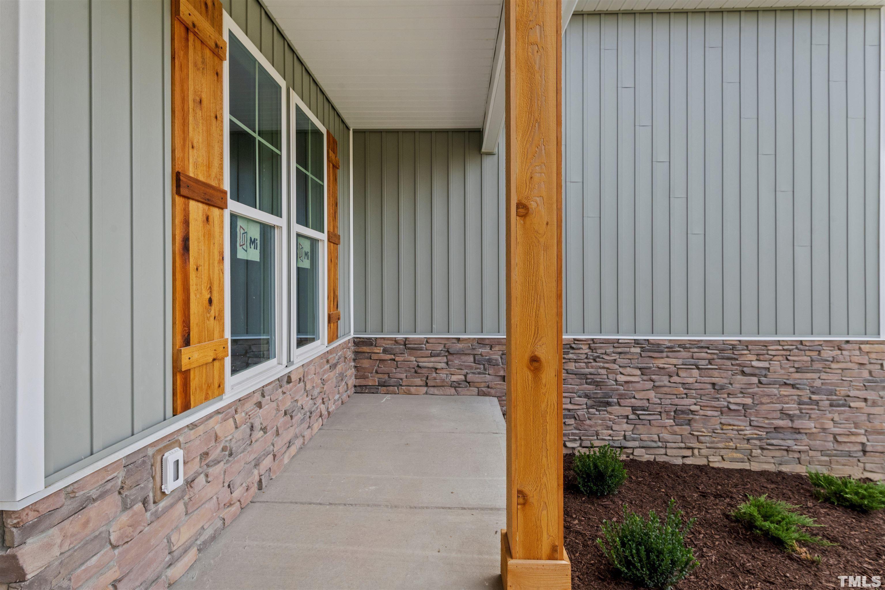 97 Buckstone Place Willow Spring, NC 27592 - Photo 10 of 21 a view of front door of house