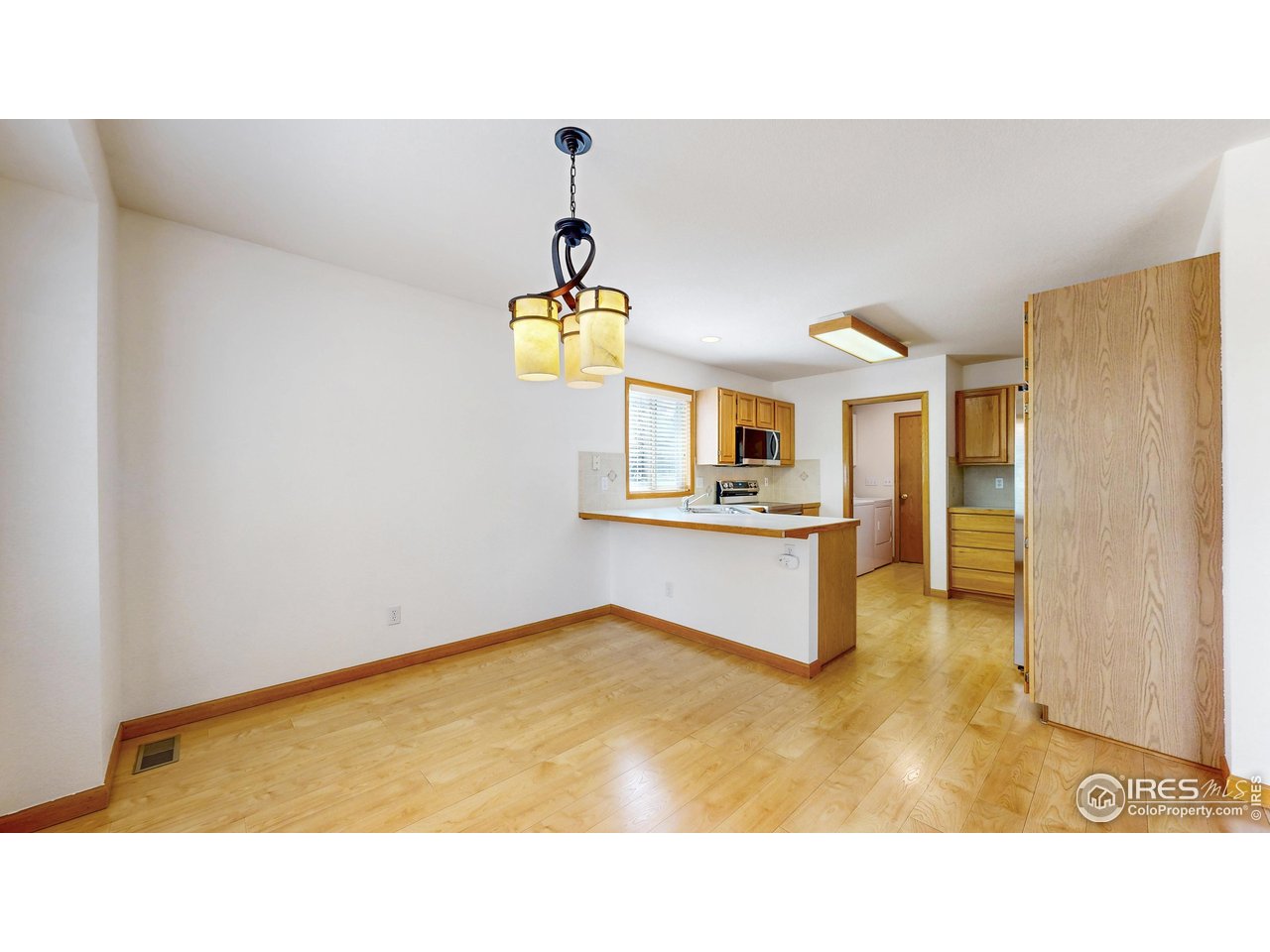 711 Eagle Lane Estes Park, CO 80517 - Photo 9 of 20 a kitchen with a sink cabinets and appliances
