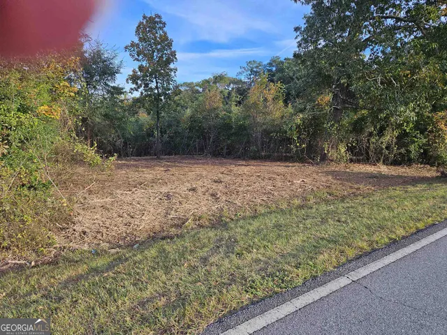a fire hydrant in the middle of a field