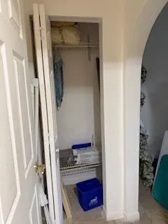 a kitchen with a refrigerator and a sink