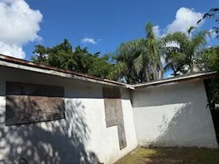 a view of balcony and yard