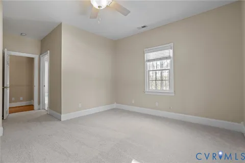 a front view of a house with parking area