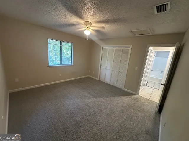 a view of a livingroom with a fan