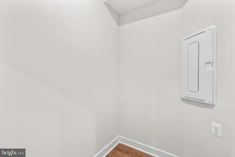 a view of a balcony with wooden floor