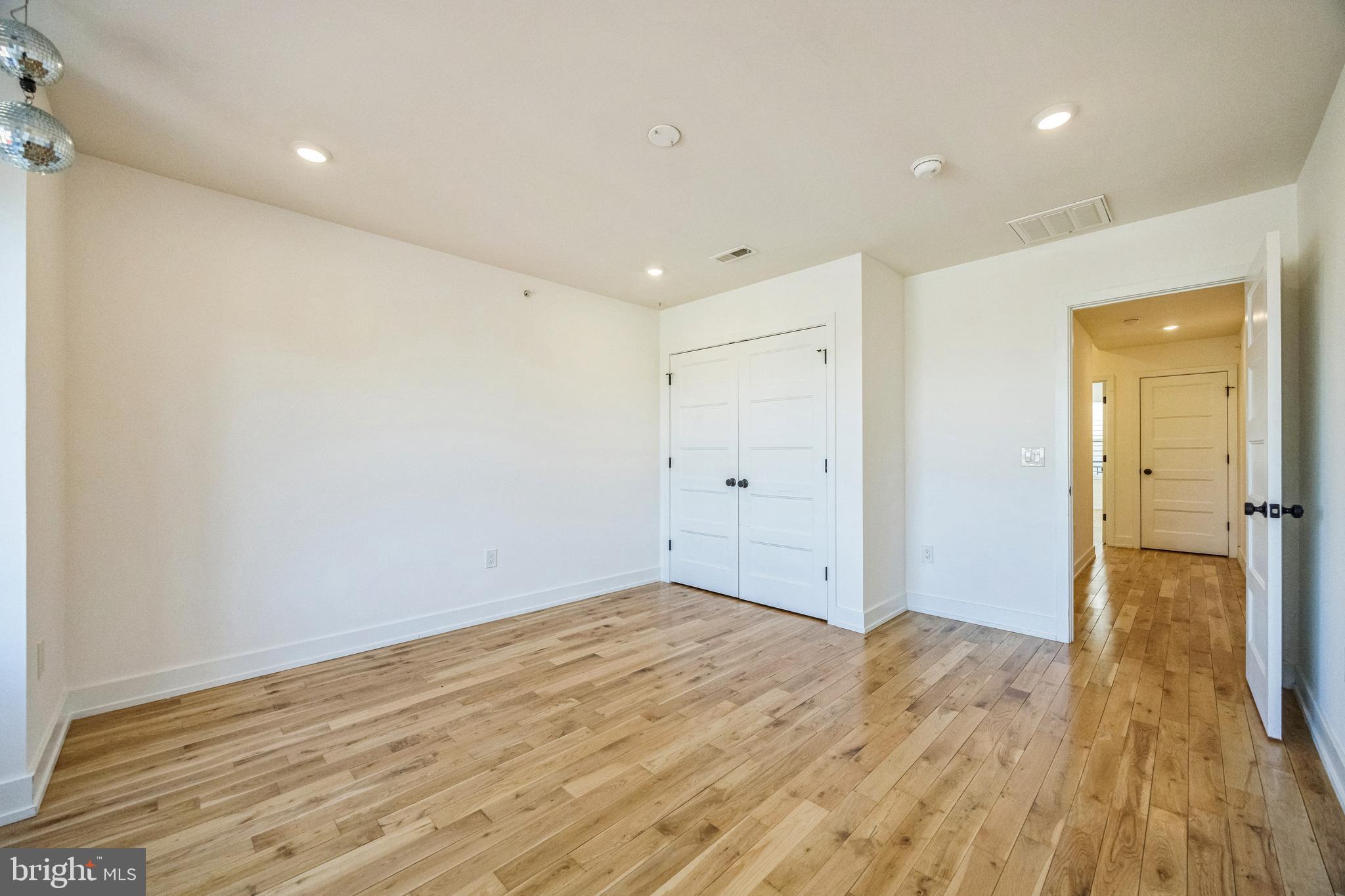 614 Master Street, Unit 2 Philadelphia, PA 19122 - Photo 23 of 29 a view of a room with wooden floor