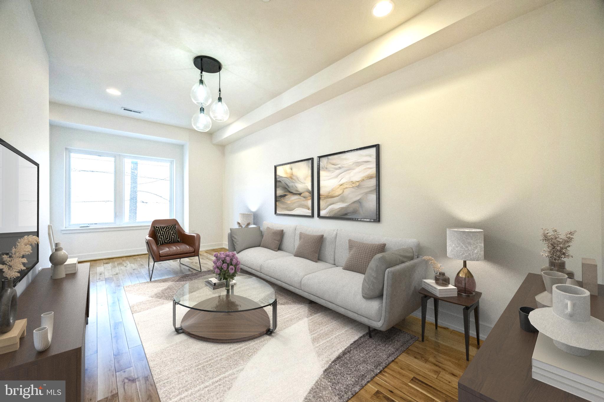 614 Master Street, Unit 2 Philadelphia, PA 19122 - Photo 7 of 29 a living room with furniture and a large window