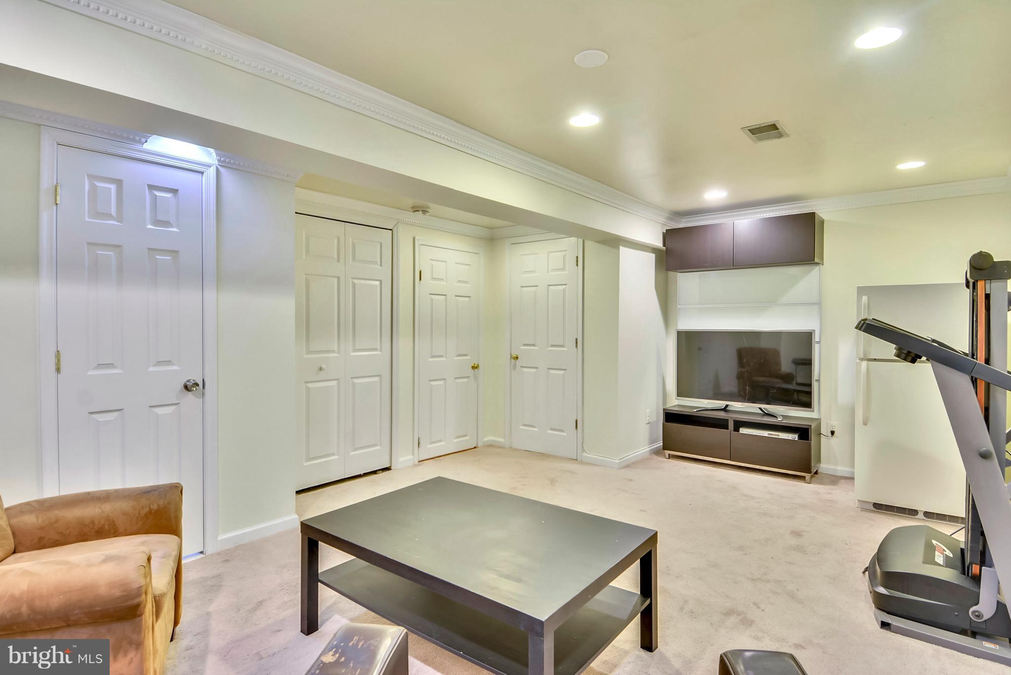 7526 Mandan Road Greenbelt, MD 20770 - Photo 3 of 21 Above Ground Basement, Skylights, Full bathroom