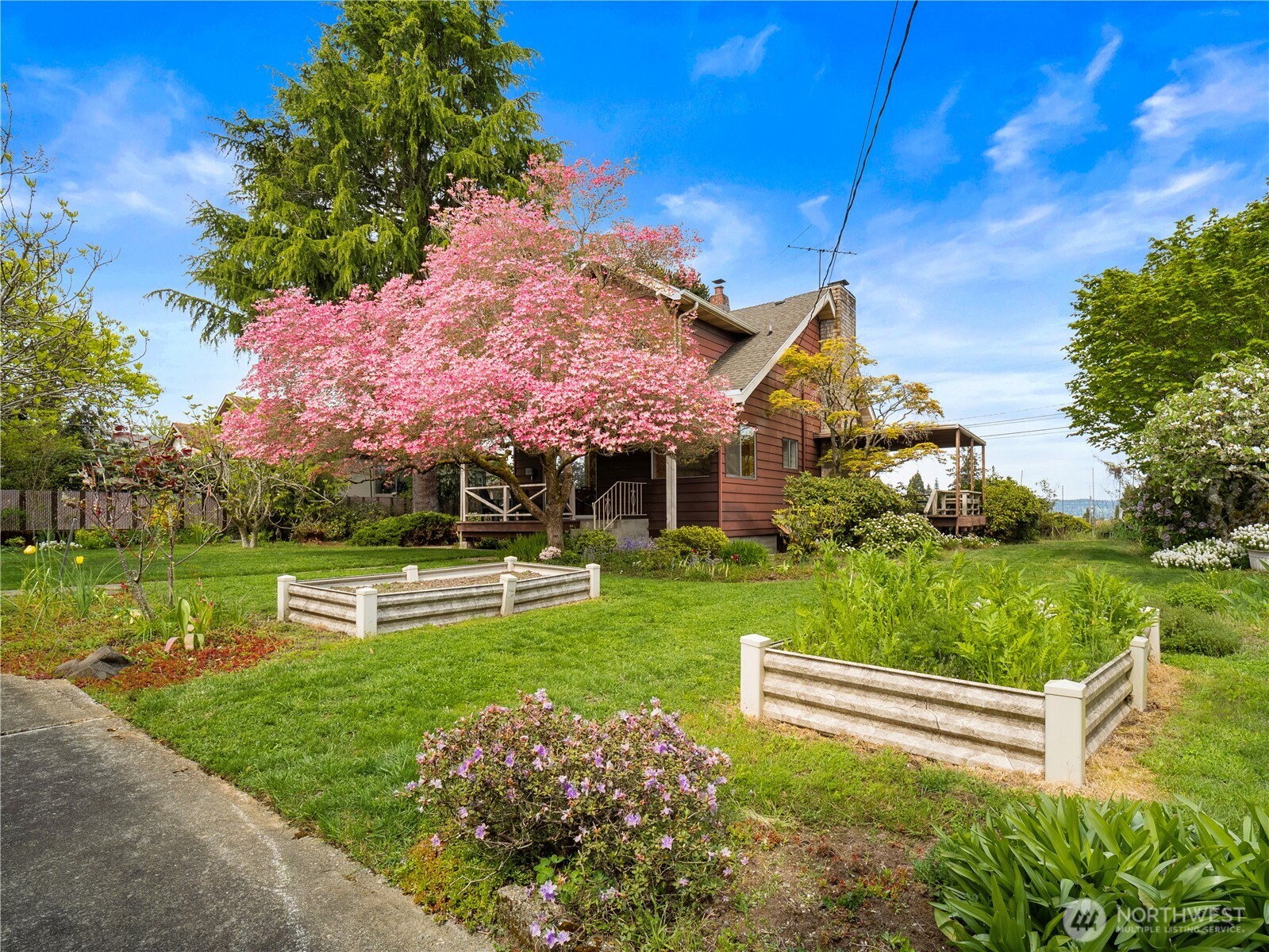 5704 North Ruby Street Tacoma, WA 98407 - Photo 28 of 38 a view of a house with a yard