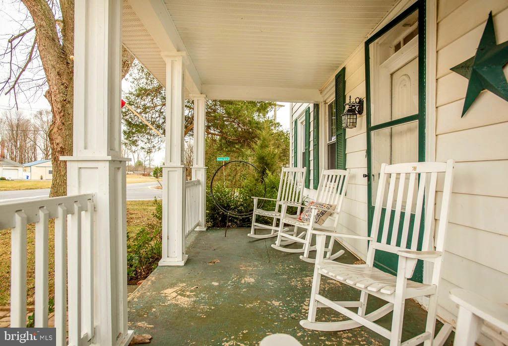 4977 Kenton Road Dover, DE 19904 - Photo 2 of 33 Relax on the covered front porch