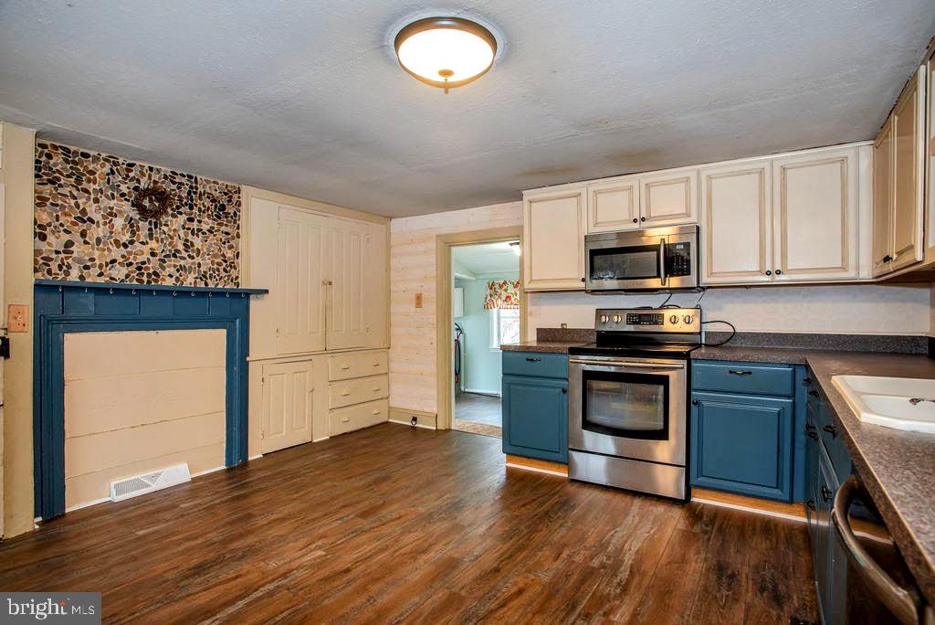 4977 Kenton Road Dover, DE 19904 - Photo 5 of 33 Kitchen offers large built in wall storage area