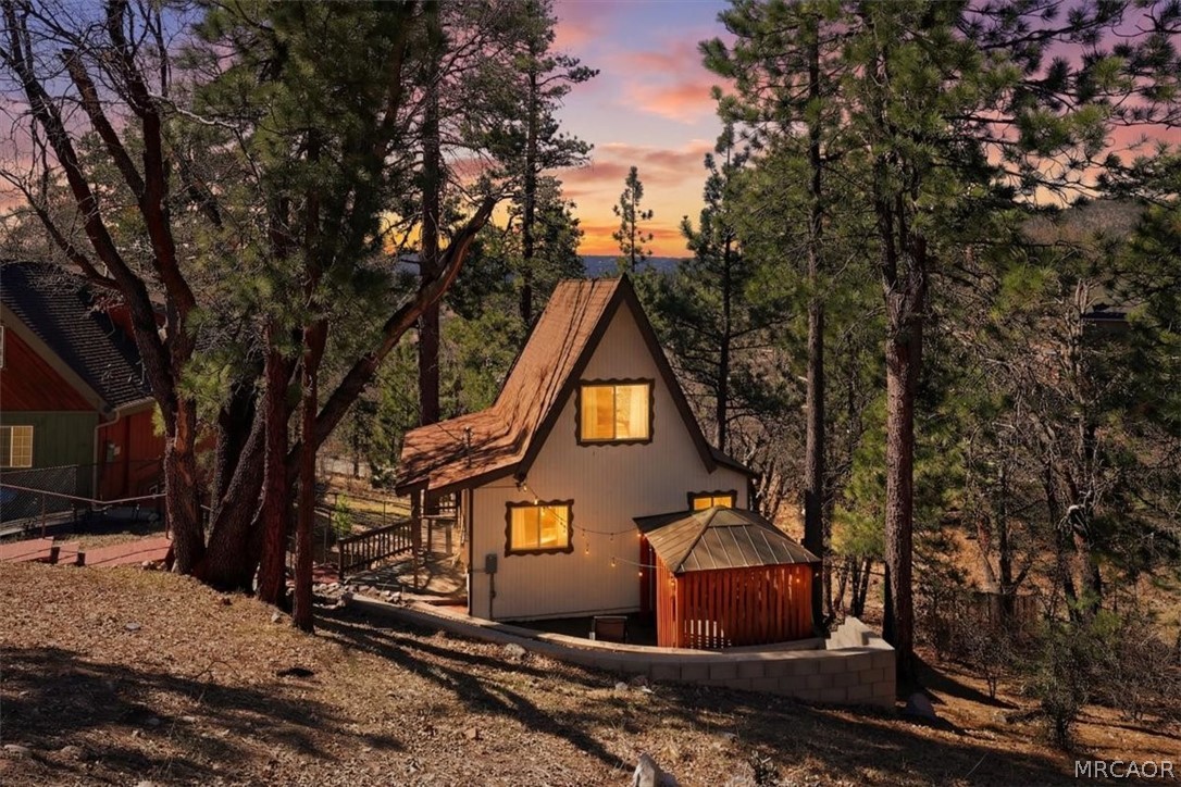 1146 Ridge Road Fawnskin, CA 92333 - Photo 2 of 34 a house view with a backyard space