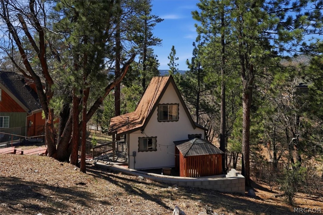 1146 Ridge Road Fawnskin, CA 92333 - Photo 26 of 34 a view of a house with a yard