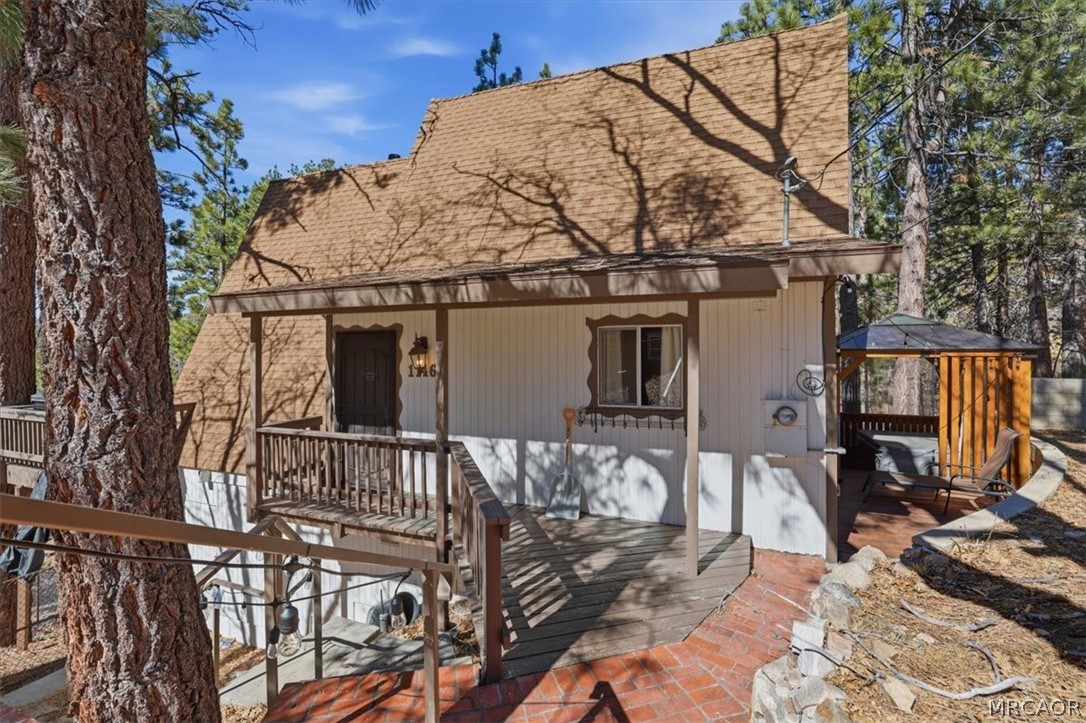 1146 Ridge Road Fawnskin, CA 92333 - Photo 29 of 34 a view of a house with snow on the wall