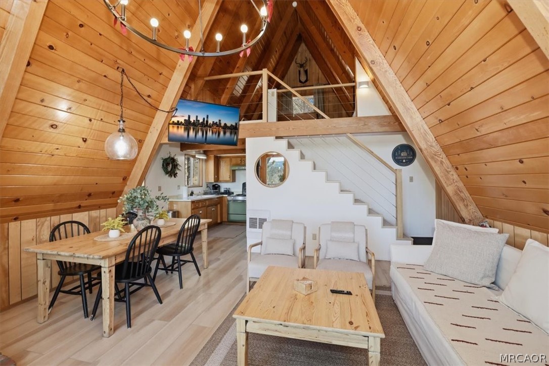 1146 Ridge Road Fawnskin, CA 92333 - Photo 8 of 34 a front view of a house with outdoor seating