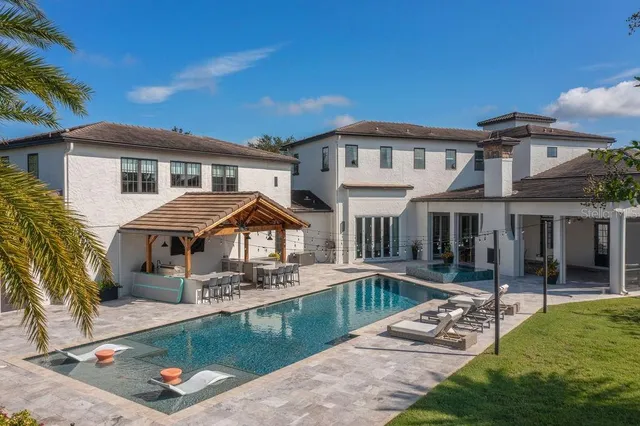 a view of house with outdoor seating space