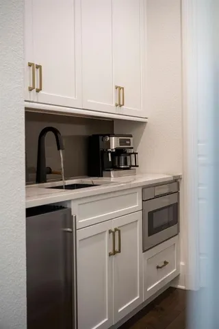 an aerial view of a house with outdoor space