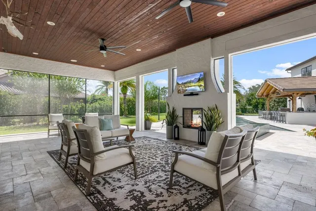 a view of hallway with wooden floor
