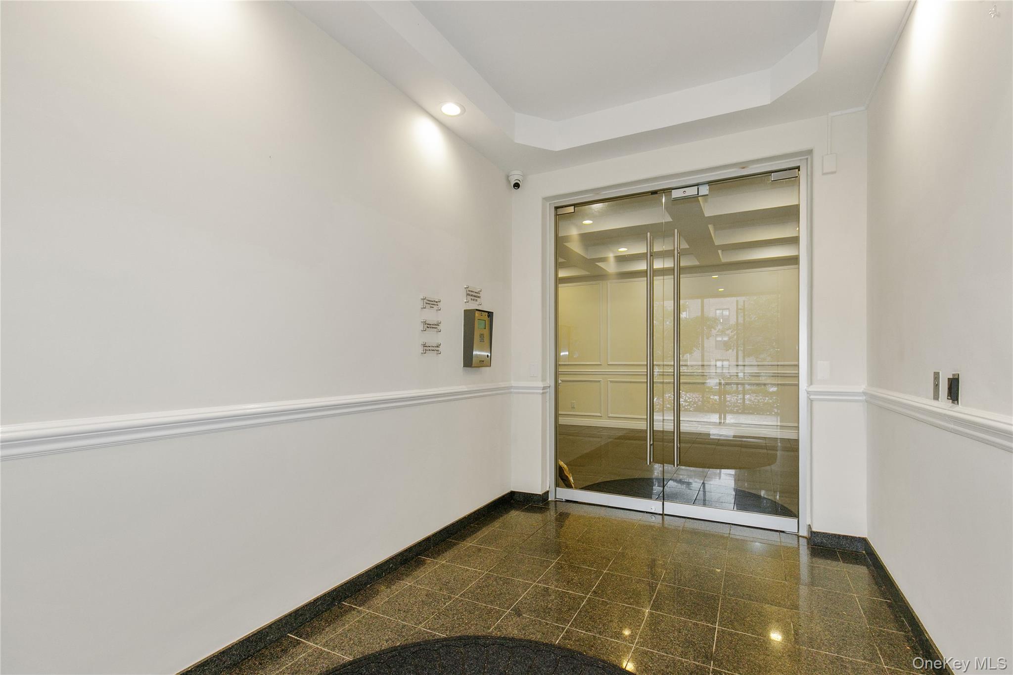 15 Canterbury Road, Unit C10 Great Neck, NY 11021 - Photo 16 of 22 a view of an empty room