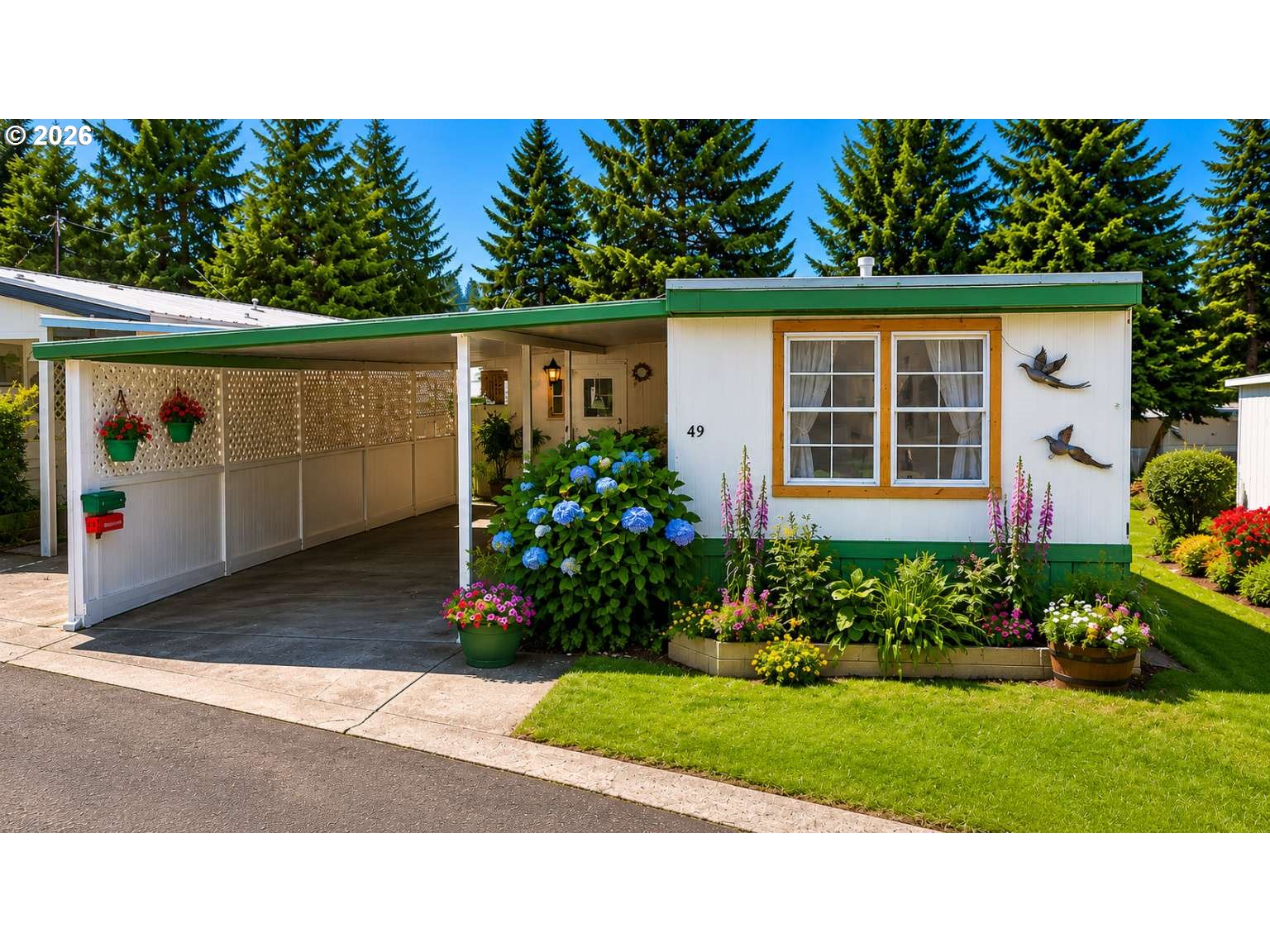 1413 Hawthorne Avenue, Unit 49 Reedsport, OR 97467 - Photo 1 of 10 a black and white photo of a house