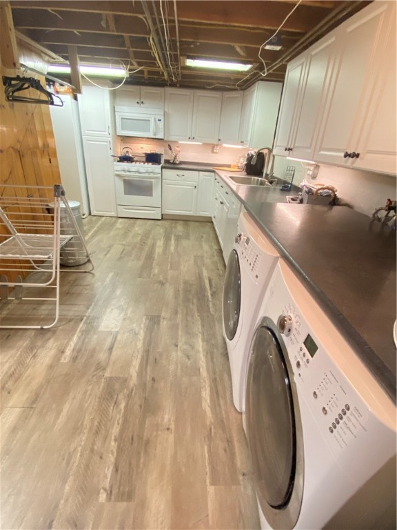 26 Caren Drive Irondequoit, NY 14622 - Photo 39 of 49 Basement Kitchen & Laundry