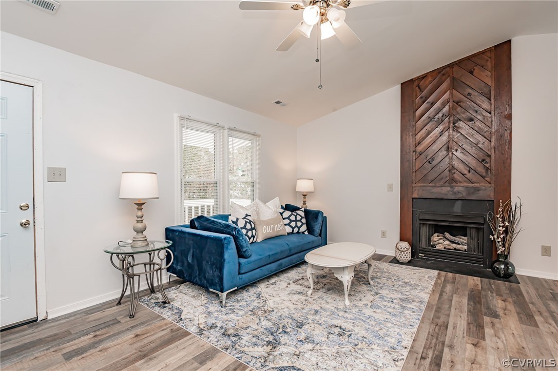 4836 Alberta Road Chesterfield, VA 23832 - Photo 6 of 27 a living room with furniture and a fireplace