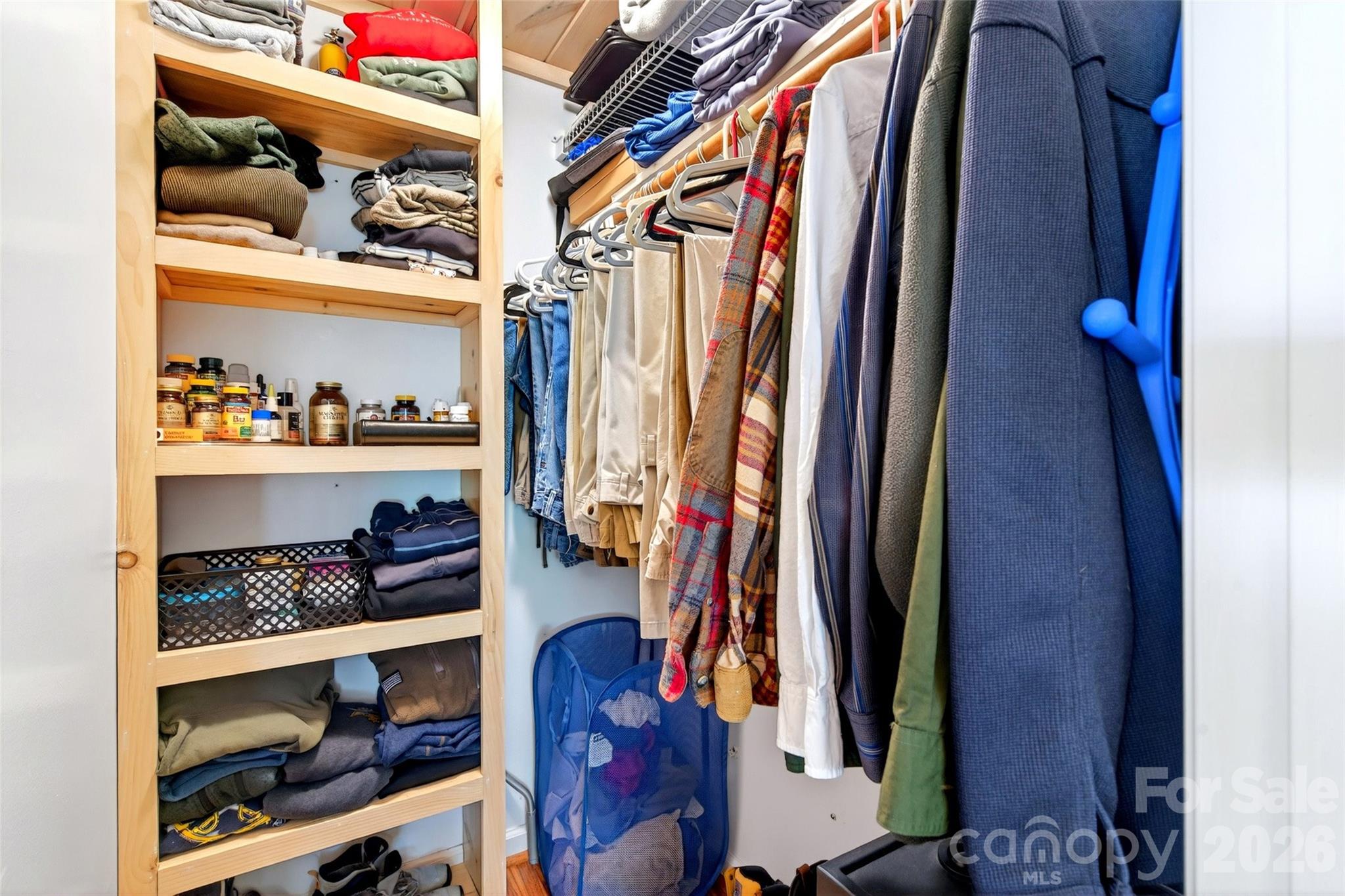 334 Harbor Lake Road Newland, NC 28657 - Photo 24 of 48 a view of walk in closet with clothes and shoes