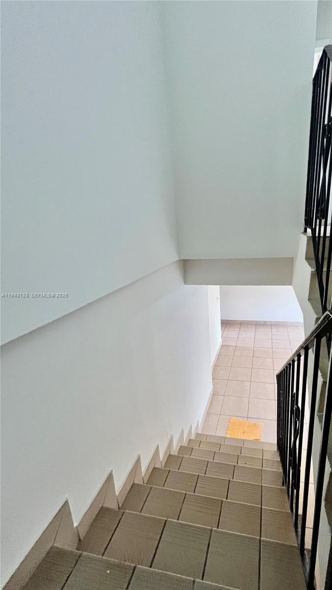 1127 West 37th Street Hialeah, FL 33012 - Photo 16 of 16 a view of entryway with stairs
