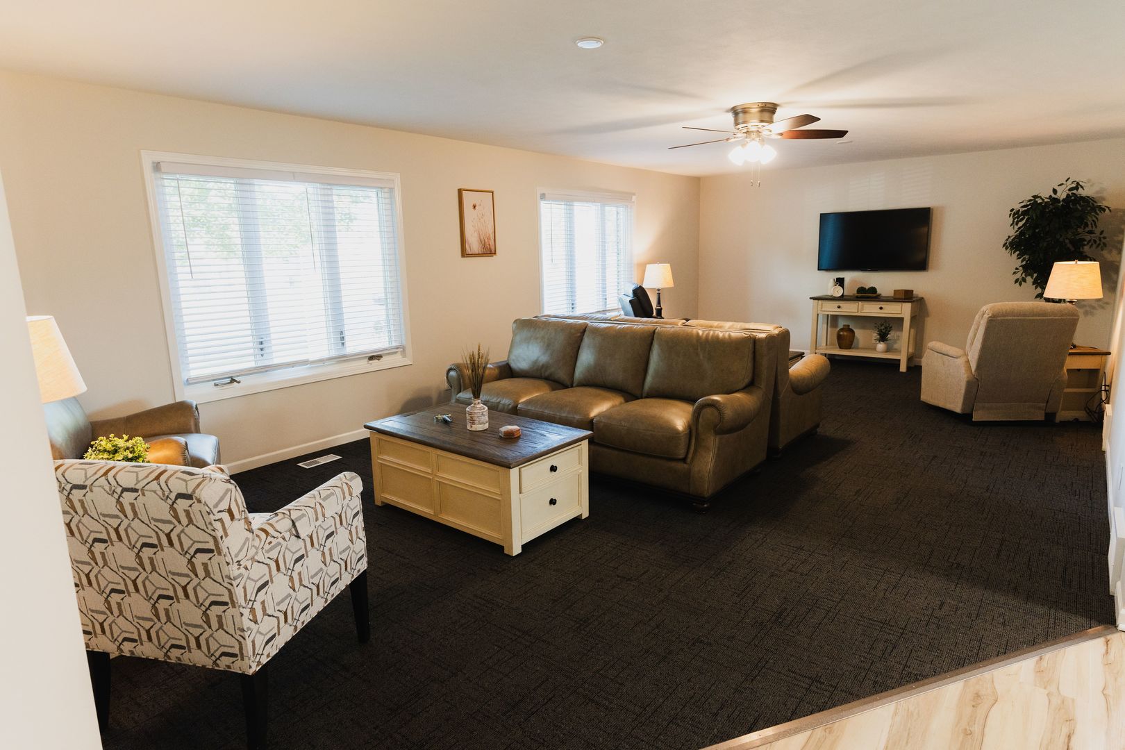 807 3rd Street Durant, IA 52747 - Photo 11 of 23 a living room with furniture and a flat screen tv