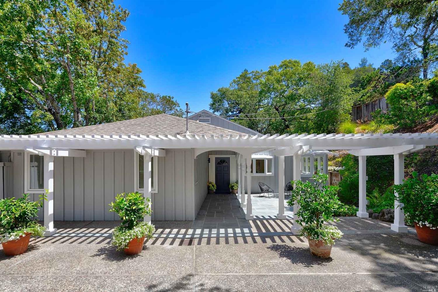 127 South Ridgewood Road Kentfield, CA 94904 - Photo 1 of 1 a front view of a house with plants
