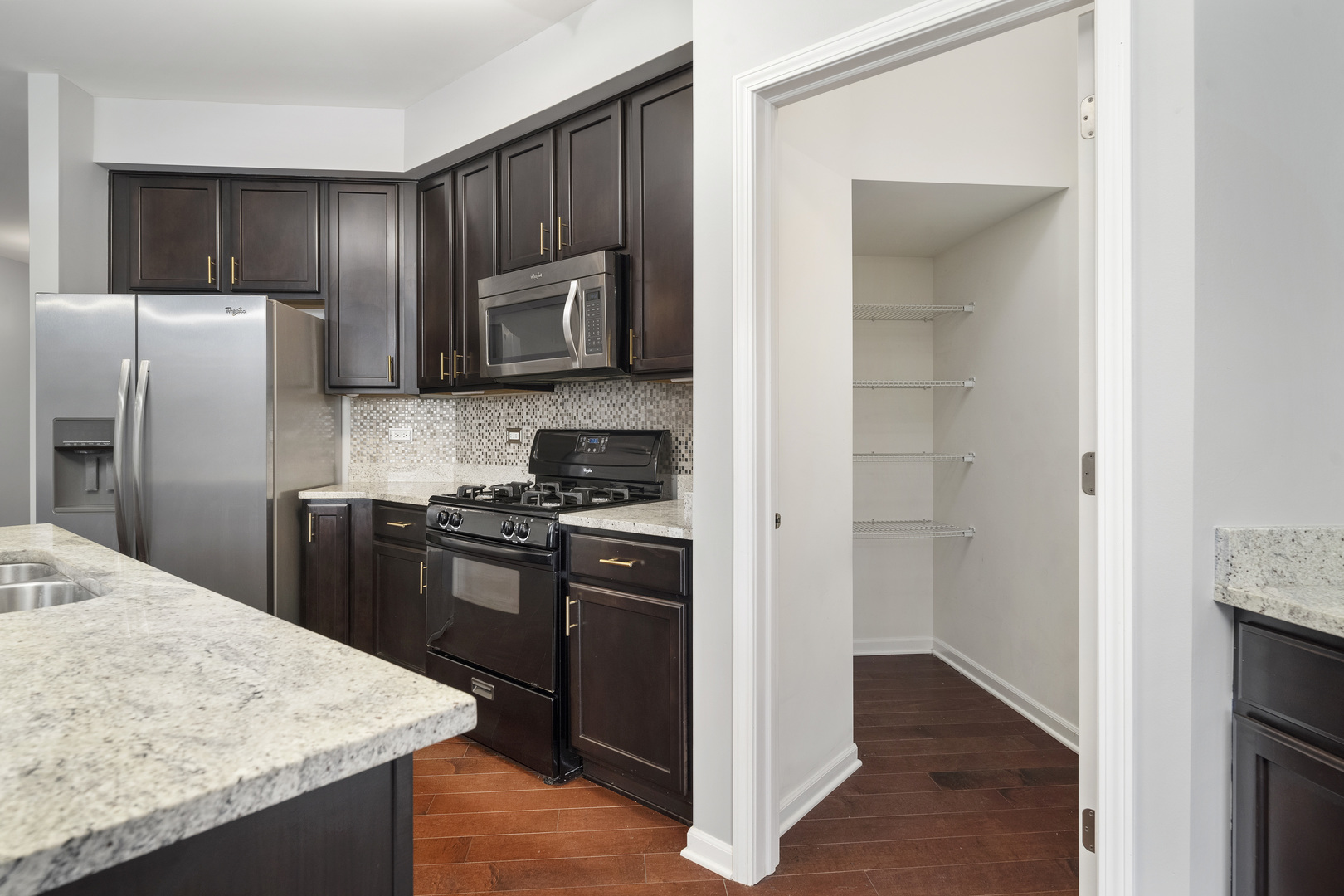 2900 Church Road Aurora, IL 60502 - Photo 5 of 15 a kitchen with stainless steel appliances granite countertop a refrigerator stove and oven
