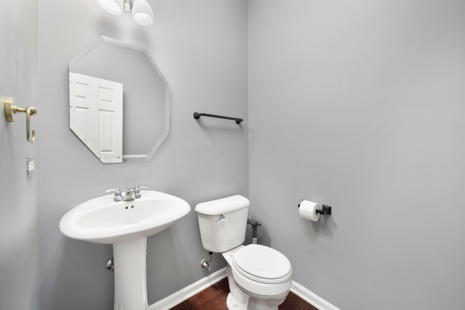 2900 Church Road Aurora, IL 60502 - Photo 7 of 15 a bathroom with a toilet sink and mirror